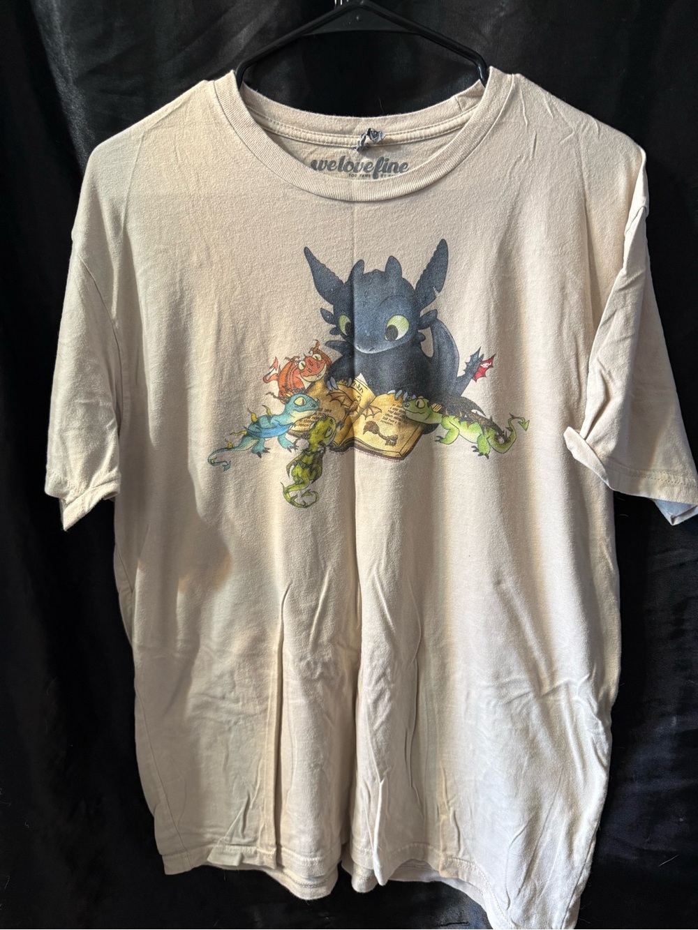 Cream Graphic Tee featuring Toothless